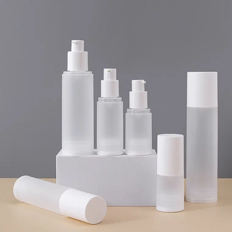 White frosted empty airless bottles displayed in different capacities